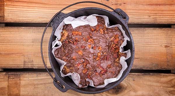 Your biggest challenge with the Dutch oven Peanut Butter, Chocolate, Bacon bars will be keeping them away until they are cool enough to eat!