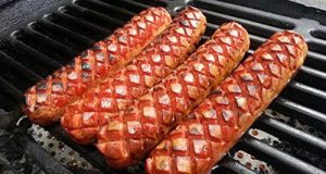 Slotdog Review: This tool creates slots in skinless hotdogs to allow more caramelization and plumping.