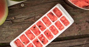 Ice cube tray filled with chopped, pureed watermelon flesh, frozen and ready to drop into any beverage that could benefit from a hint of watermelon.